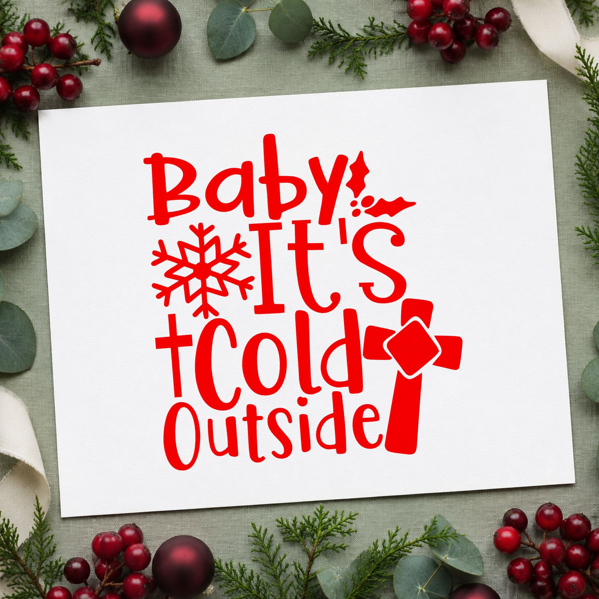 Baby It's Cold Outside Cross rubber stamp shown in red ink, stamped for projects such as supply bin labels.
