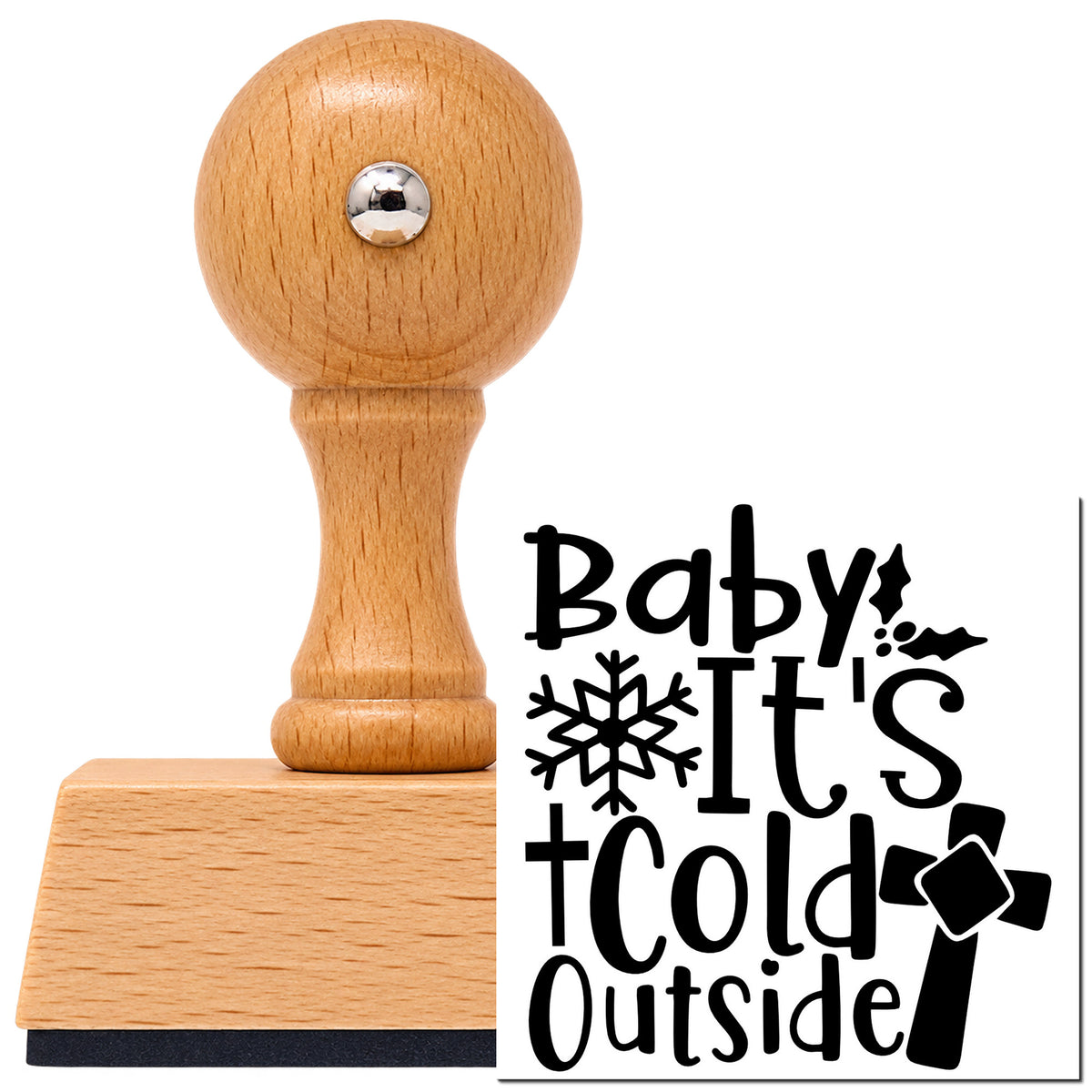 Baby It's Cold Outside With Cross Vintage Pro rubber stamp in European beech wood with a round knob handle, shown beside its black imprint.