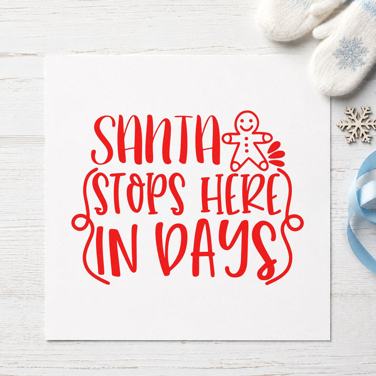 Santa Stops Here In Days rubber stamp shown in red ink, stamped for projects such as drawer number labels.