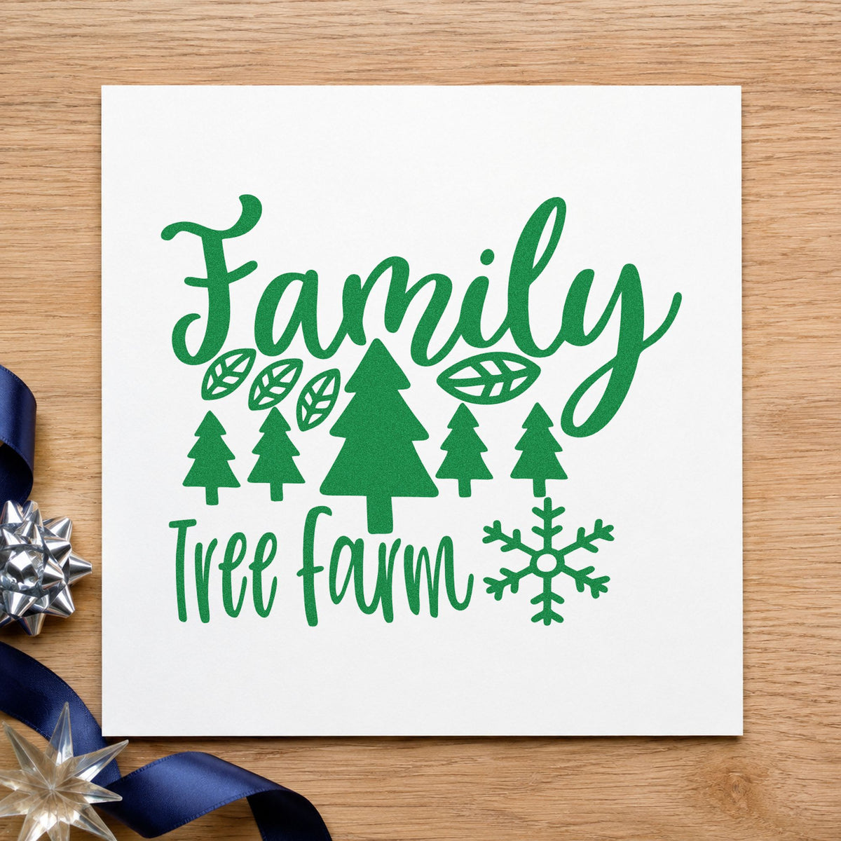 Family Tree Farm Winter craft stamp imprint in green ink on a handmade project, one idea being customer cards.
