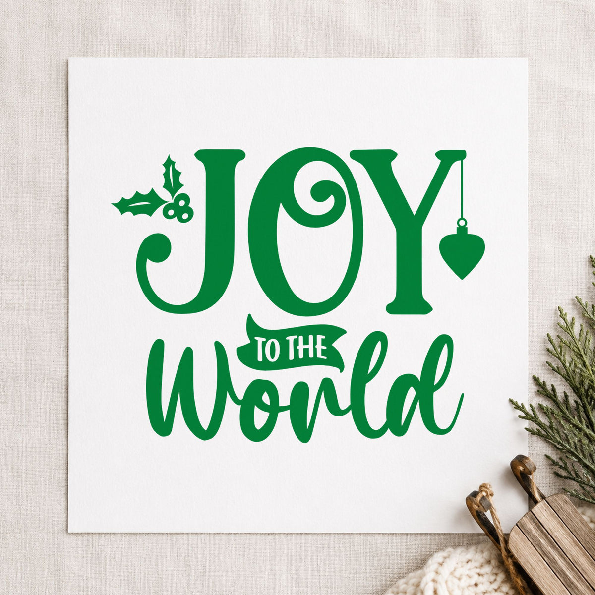 Joy To The World Holly craft stamp imprint in green ink on a handmade project, one idea being swap ticket cards.