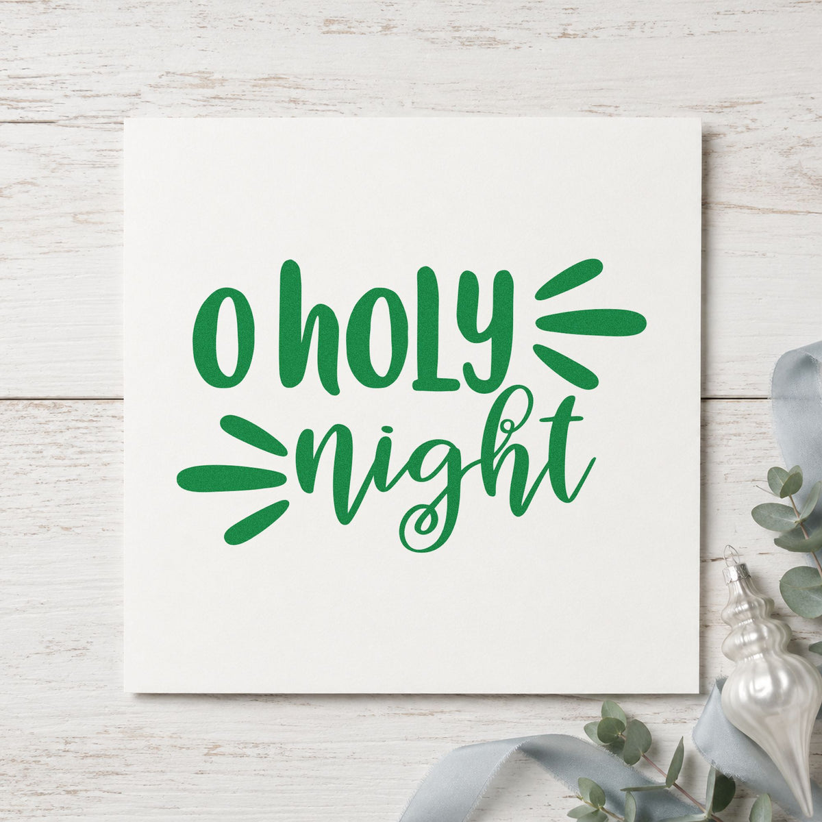 O Holy Night Script craft stamp imprint in green ink on a handmade project, one idea being program panel cards.