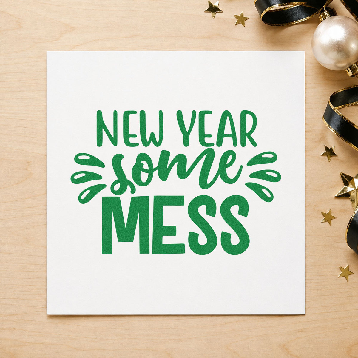 New Year Some Mess craft stamp imprinted in green ink on paper, a design suited to framed desk corner.