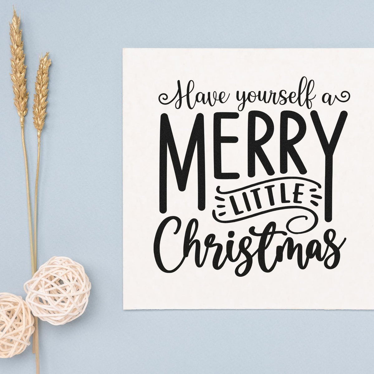 Merry Little Christmas rubber stamp design with bold black lettering for holiday cards and festive DIY crafts.