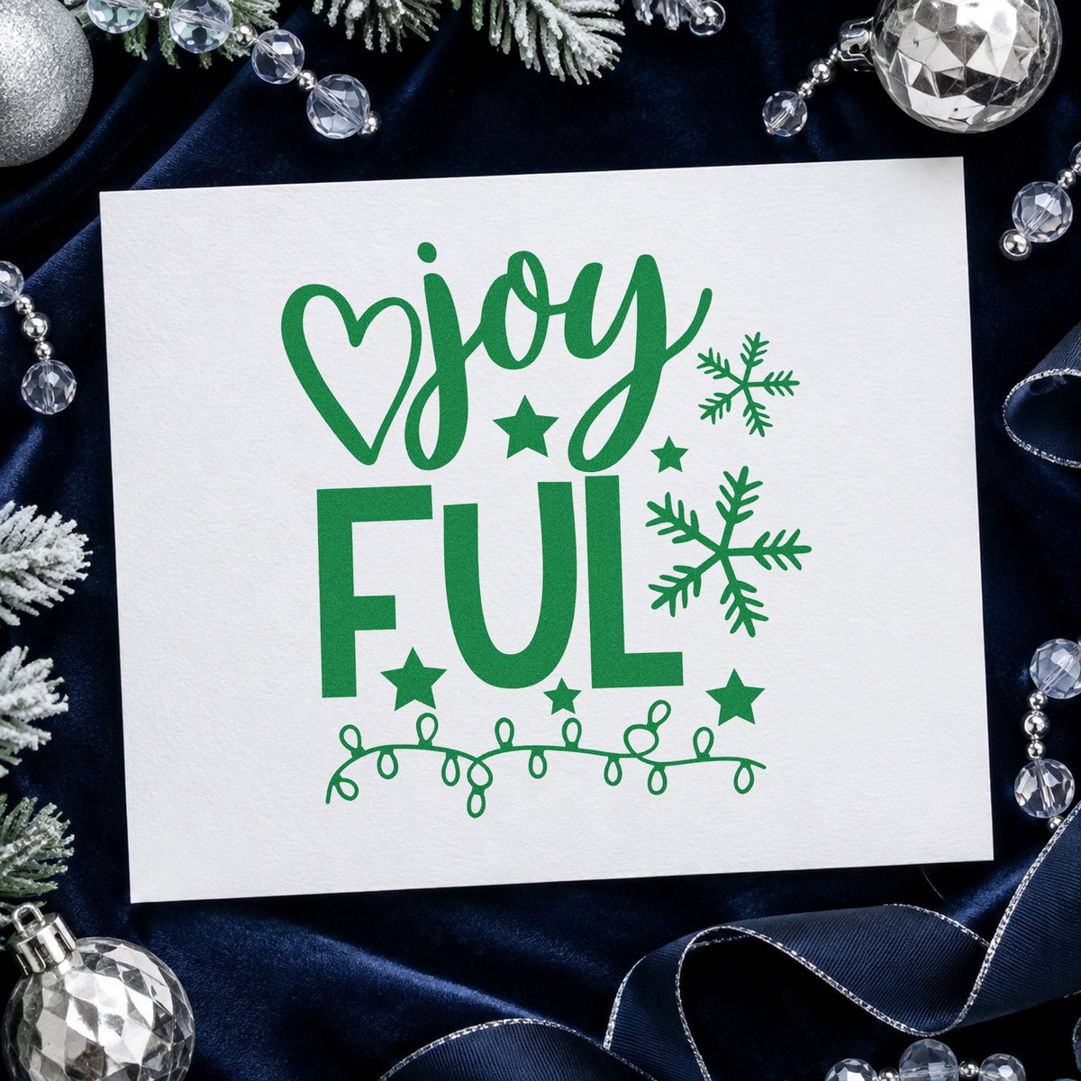 Joyful Snowflakes And Lights craft stamp imprinted in green ink on paper, a design suited to framed window ledge.
