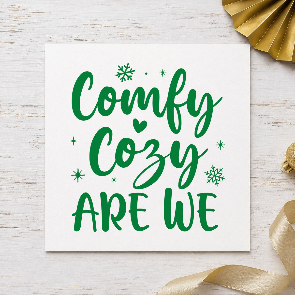 Comfy Cozy Are We craft stamp imprint in green ink on a handmade project, one idea being pajama night cards.