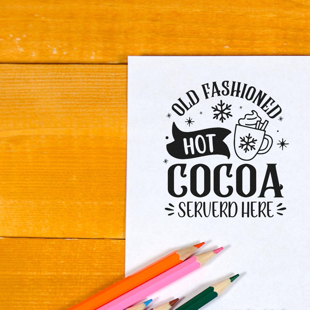 Custom rubber stamp for hot cocoa stations, reading Old Fashioned Hot Cocoa Served Here with a winter mug graphic.