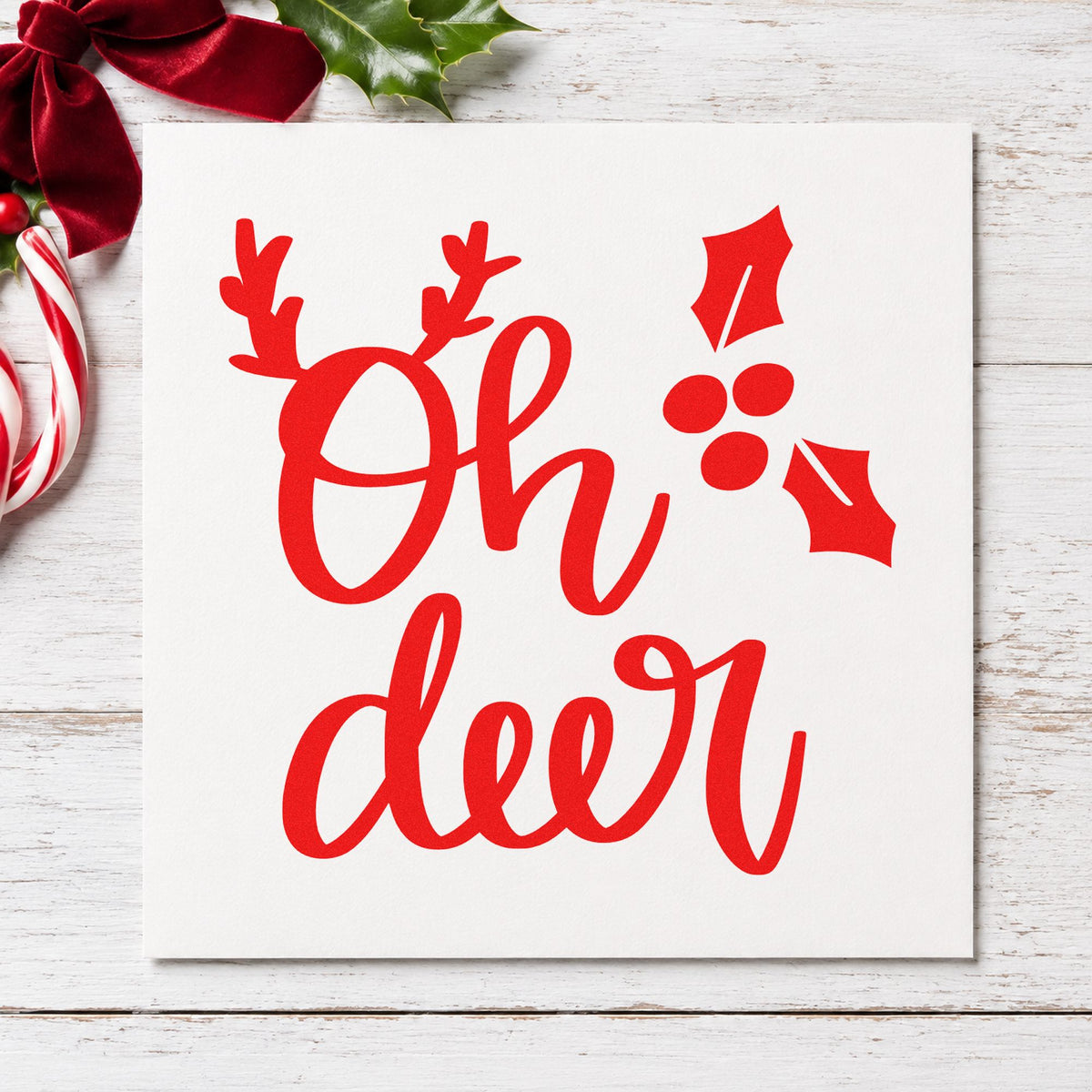 Oh Deer Antlers Holly craft stamp in red ink on cardstock, an easy option for napkin corner ink.