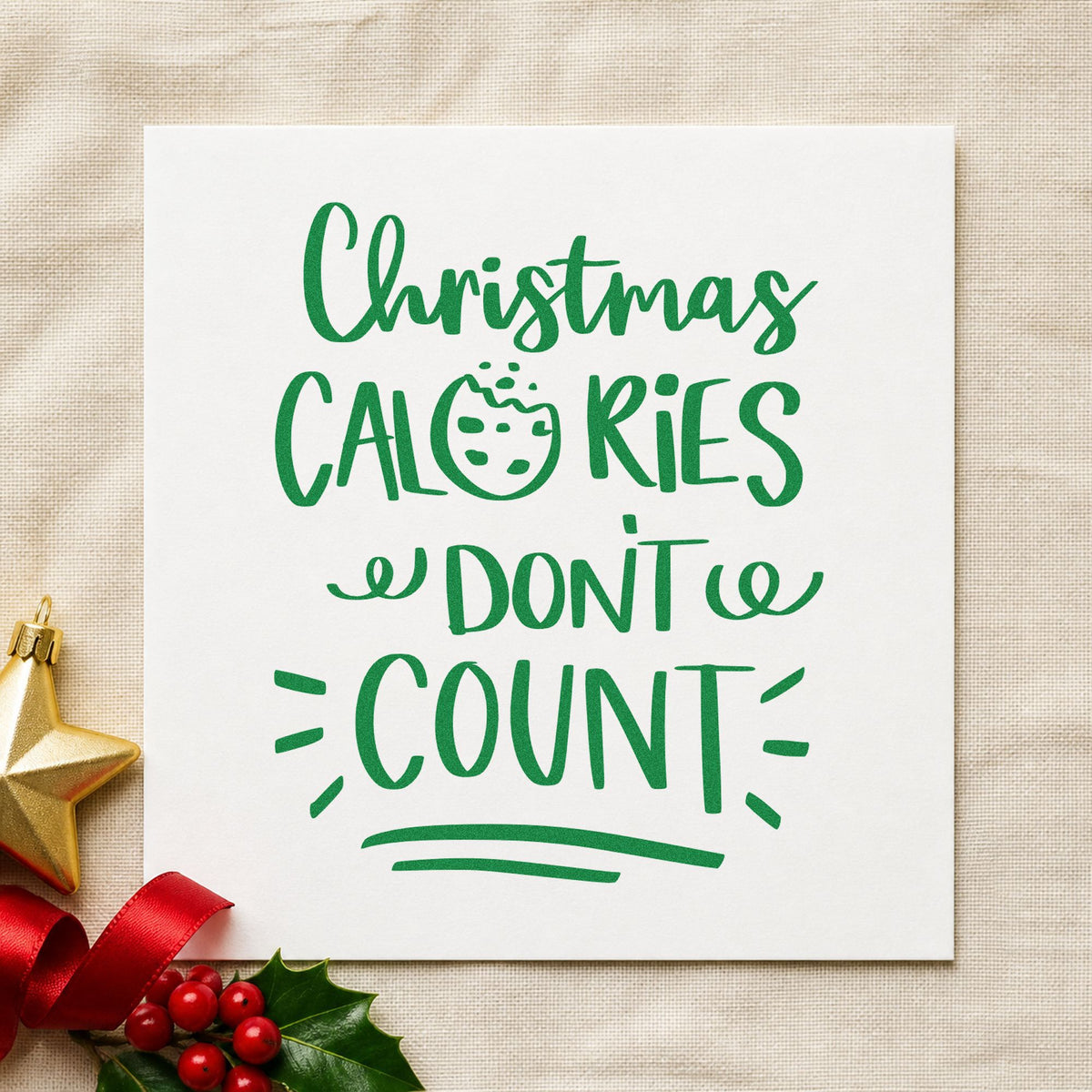 Christmas Calories Don't Count craft stamp imprint in green ink on a handmade project, one idea being sample plate cards.
