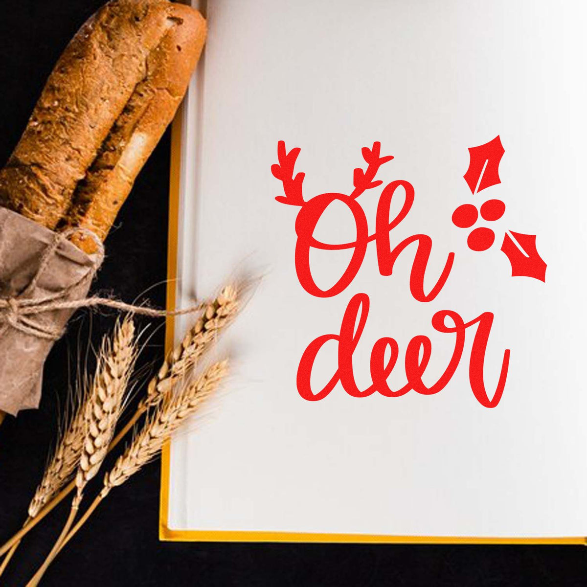 Christmas rubber stamp with Oh deer pun, antlers and holly for festive cards, gift tags, and seasonal craft projects.
