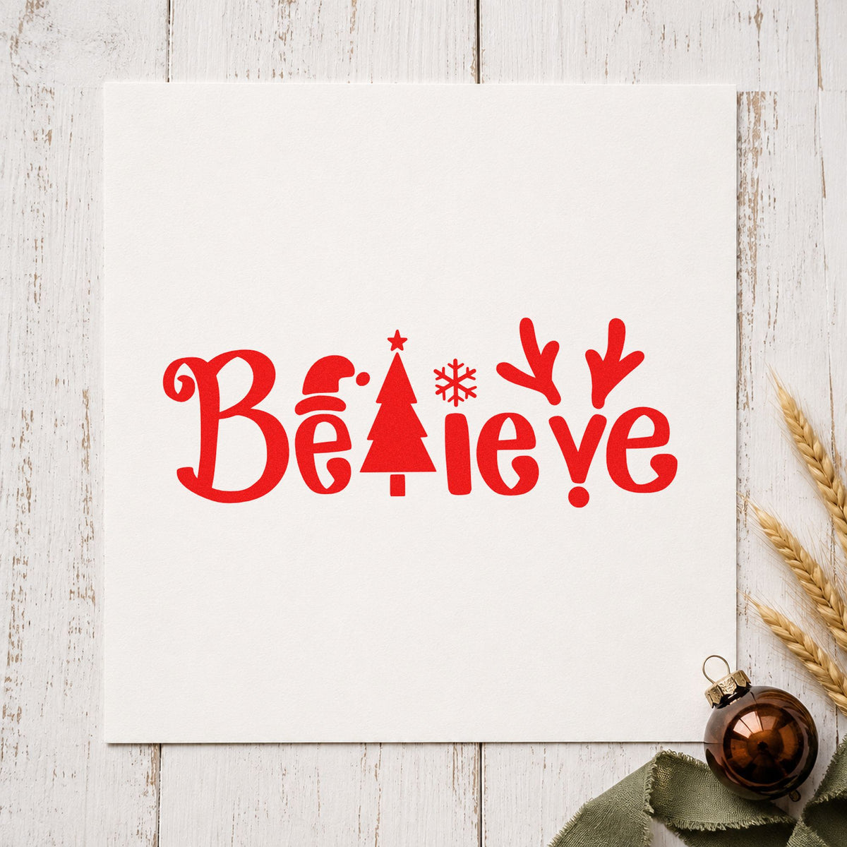 Believe Holiday Lettering Icons craft stamp in red ink on cardstock, an easy option for panel front printing.
