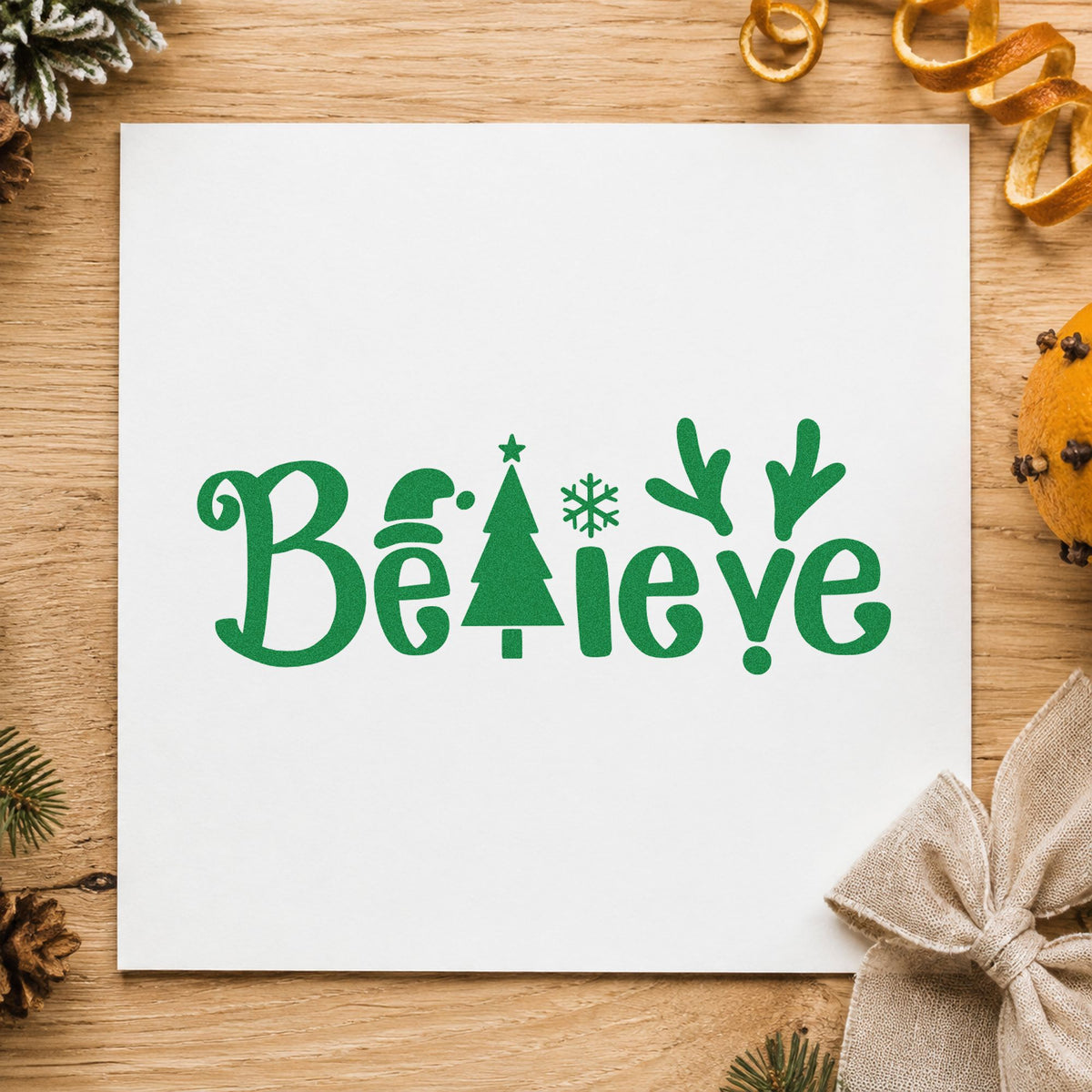 Believe Holiday Lettering Icons craft stamp imprint in green ink on a handmade project, one idea being workshop handouts.
