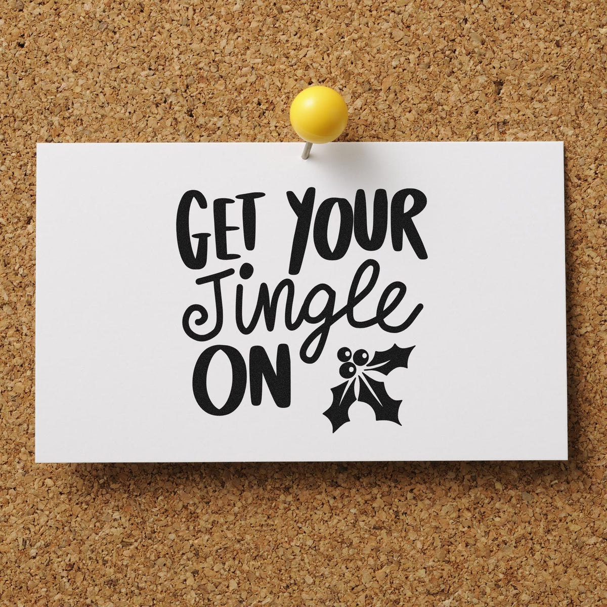 Christmas rubber stamp with Get Your Jingle On sentiment and holly design for festive holiday card making.