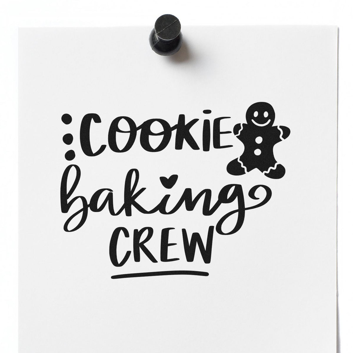 Cookie baking crew rubber stamp design with gingerbread man icon on white paper for holiday baking and DIY craft projects.