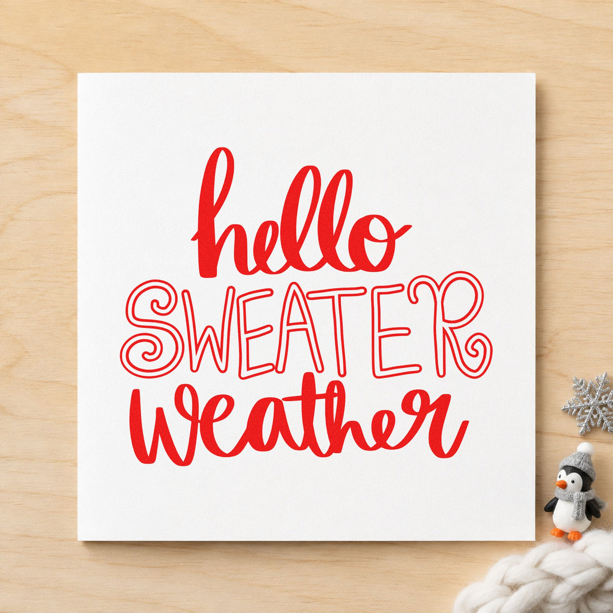 Hello Sweater Weather Lettering craft stamp in red ink on cardstock, an easy option for canvas shoe printing.