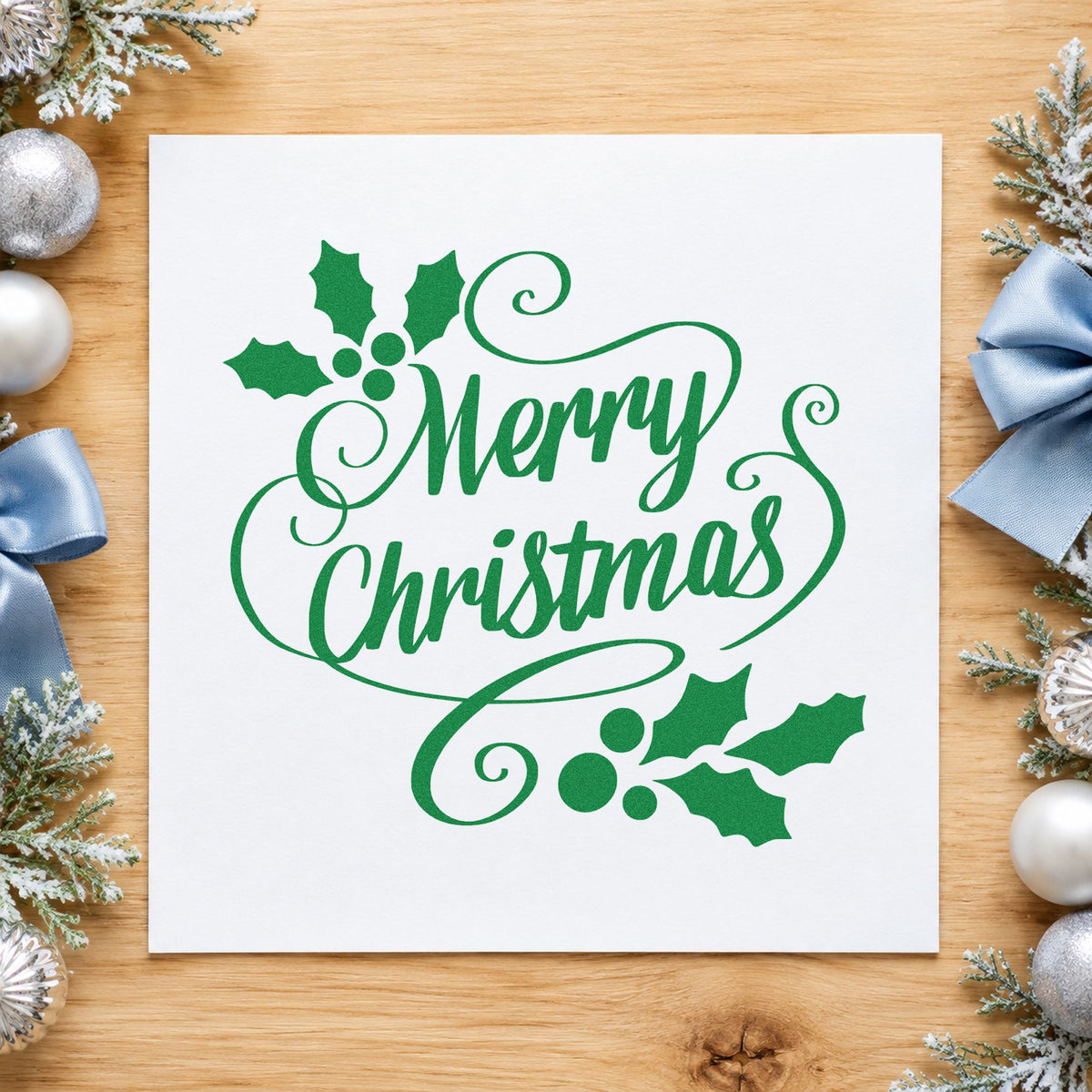 Merry Christmas Holly Flourishes craft stamp imprinted in green ink on paper, a design suited to framed mantel piece.