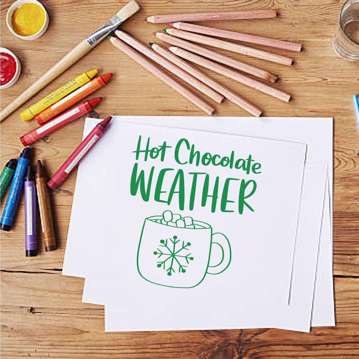 Hot Chocolate Weather Mug rubber stamp shown in green ink, stamped for projects such as drink album page.