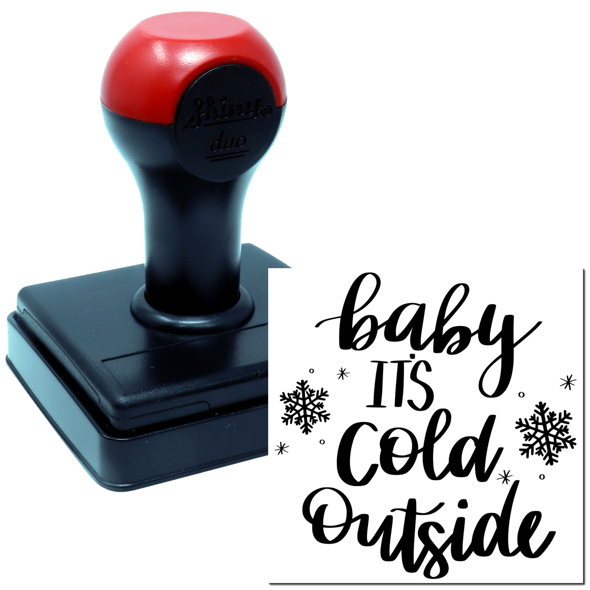Self-inking rubber stamp featuring Baby Its Cold Outside with snowflakes for winter cards and packaging.