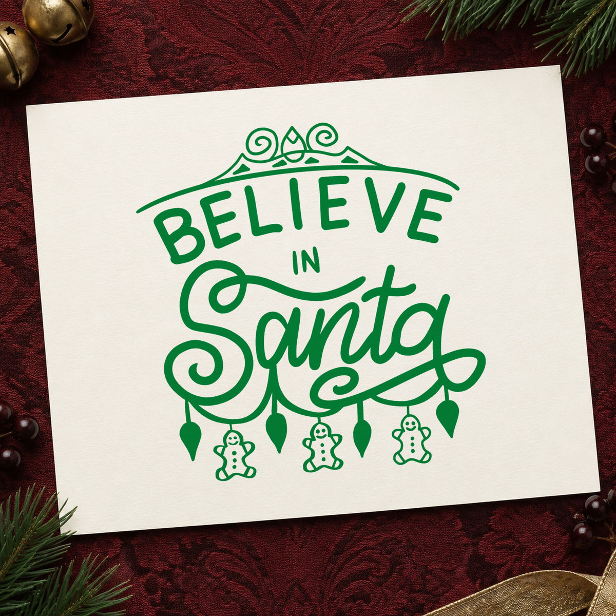 Believe In Santa Ornaments craft stamp imprint in green ink on a handmade project, one idea being cookie ornament tags.