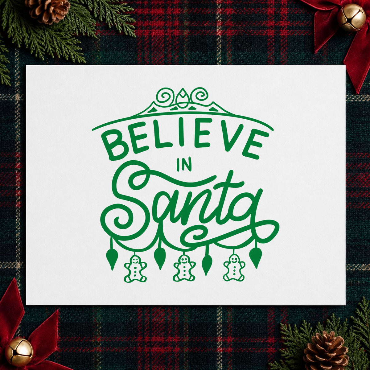 Believe In Santa Ornaments craft stamp imprinted in green ink on paper, a design suited to framed tree alcove.