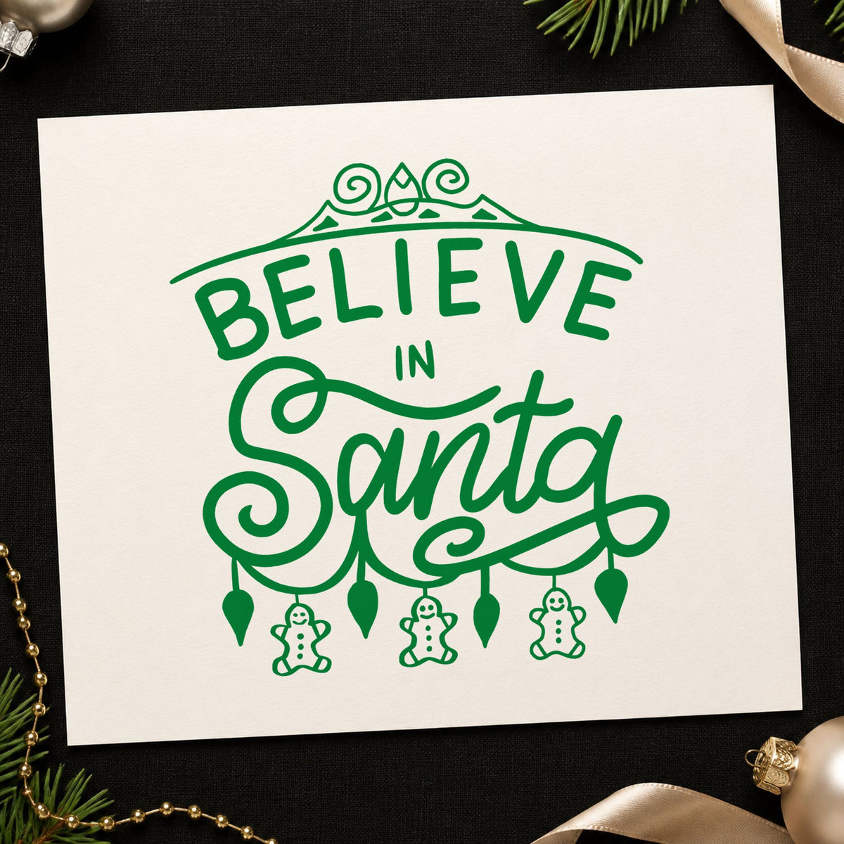 Believe In Santa Ornaments craft stamp imprint in green ink on a handmade project, one idea being swap night cards.