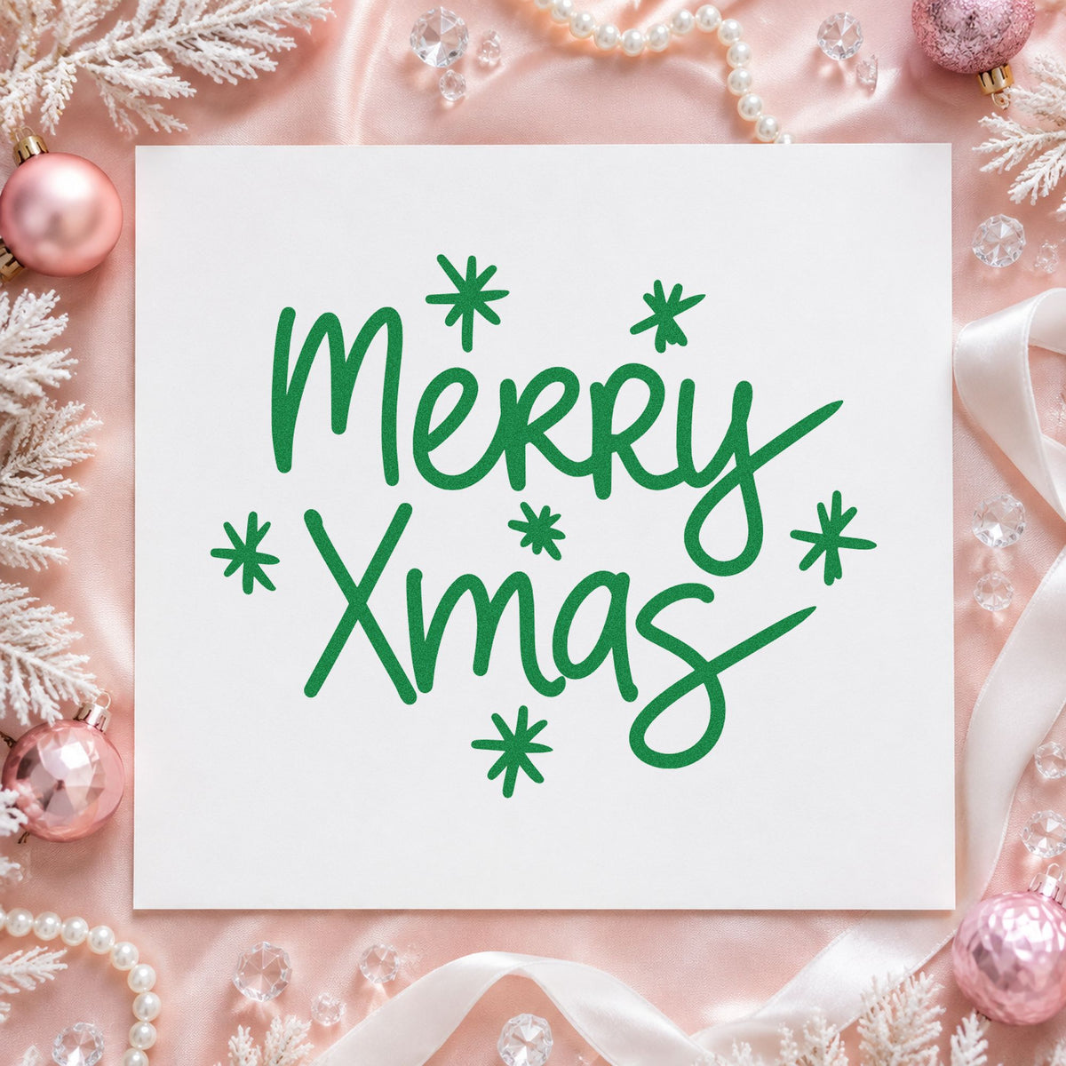 Merry Xmas Starbursts craft stamp imprinted in green ink on paper, a design suited to framed desk clip.