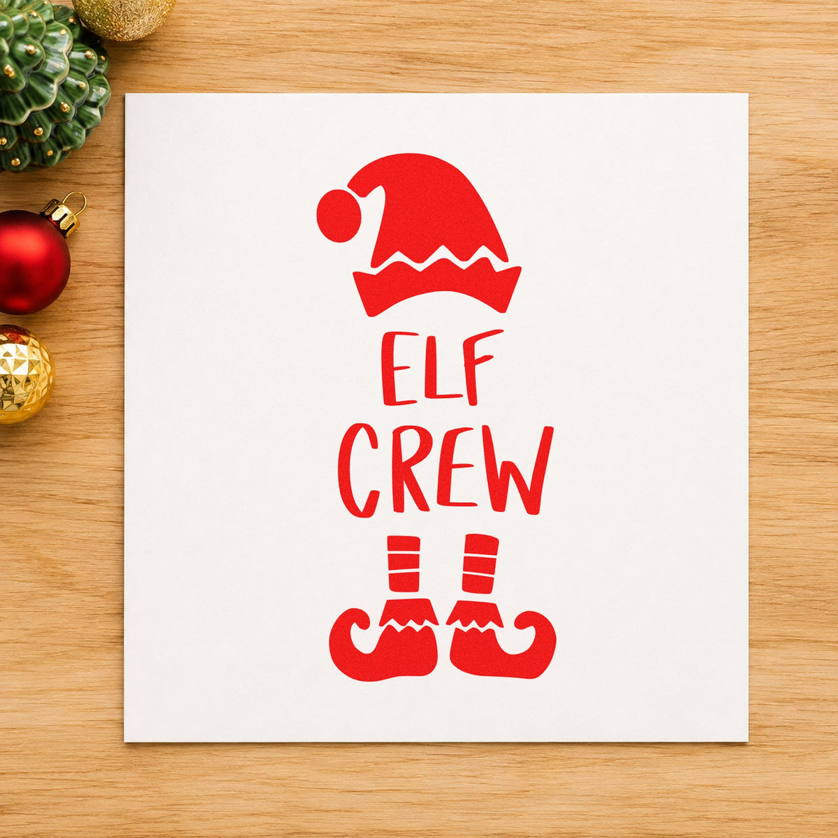 Elf Crew Hat And Shoes rubber stamp shown in red ink, stamped for projects such as costume bin labels.