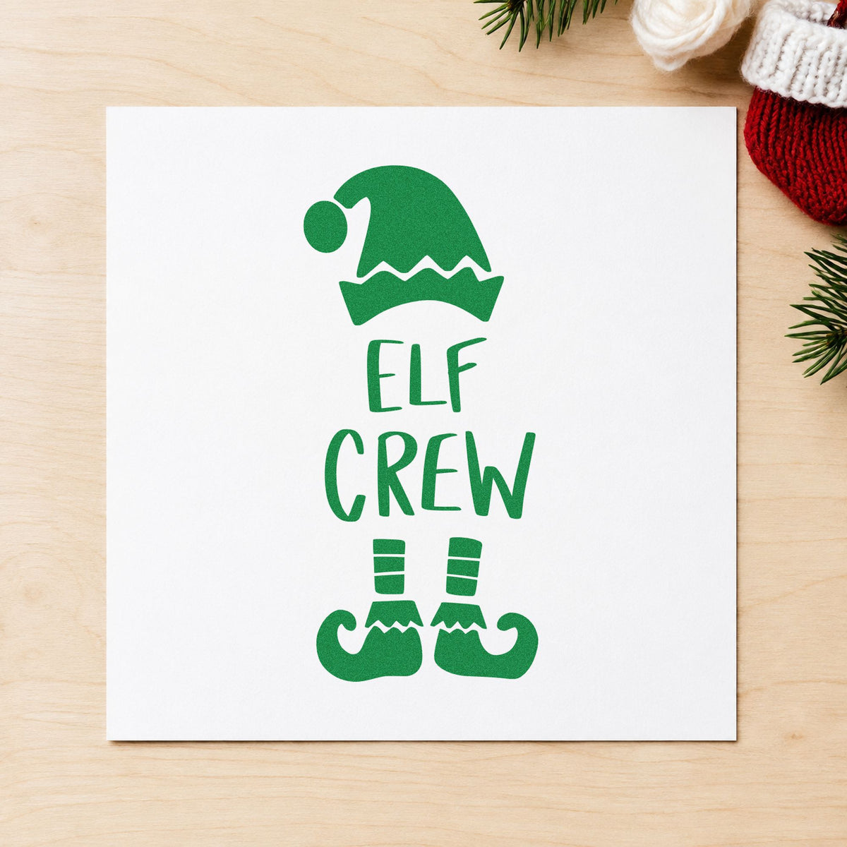 Elf Crew Hat And Shoes craft stamp imprint in green ink on a handmade project, one idea being shift badge cards.