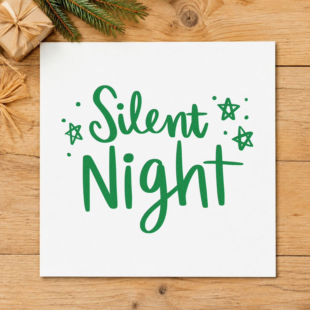 Silent Night Hand Lettering craft stamp imprint in green ink on a handmade project, one idea being viewing night cards.