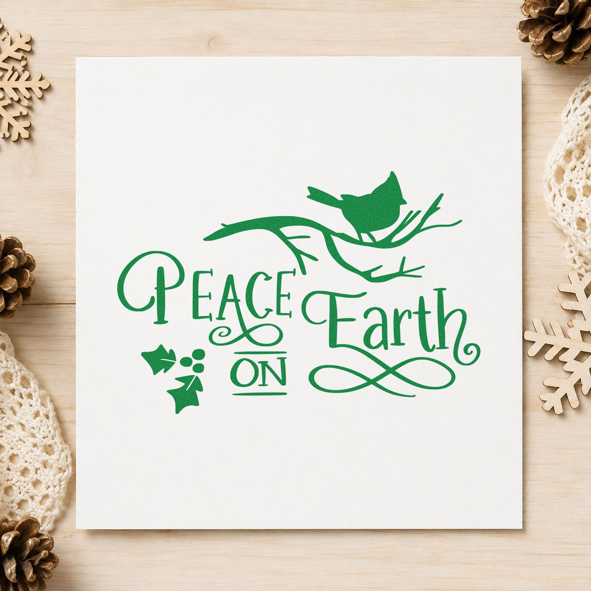 Peace On Earth Bird Branch craft stamp imprint in green ink on a handmade project, one idea being walk guide cards.