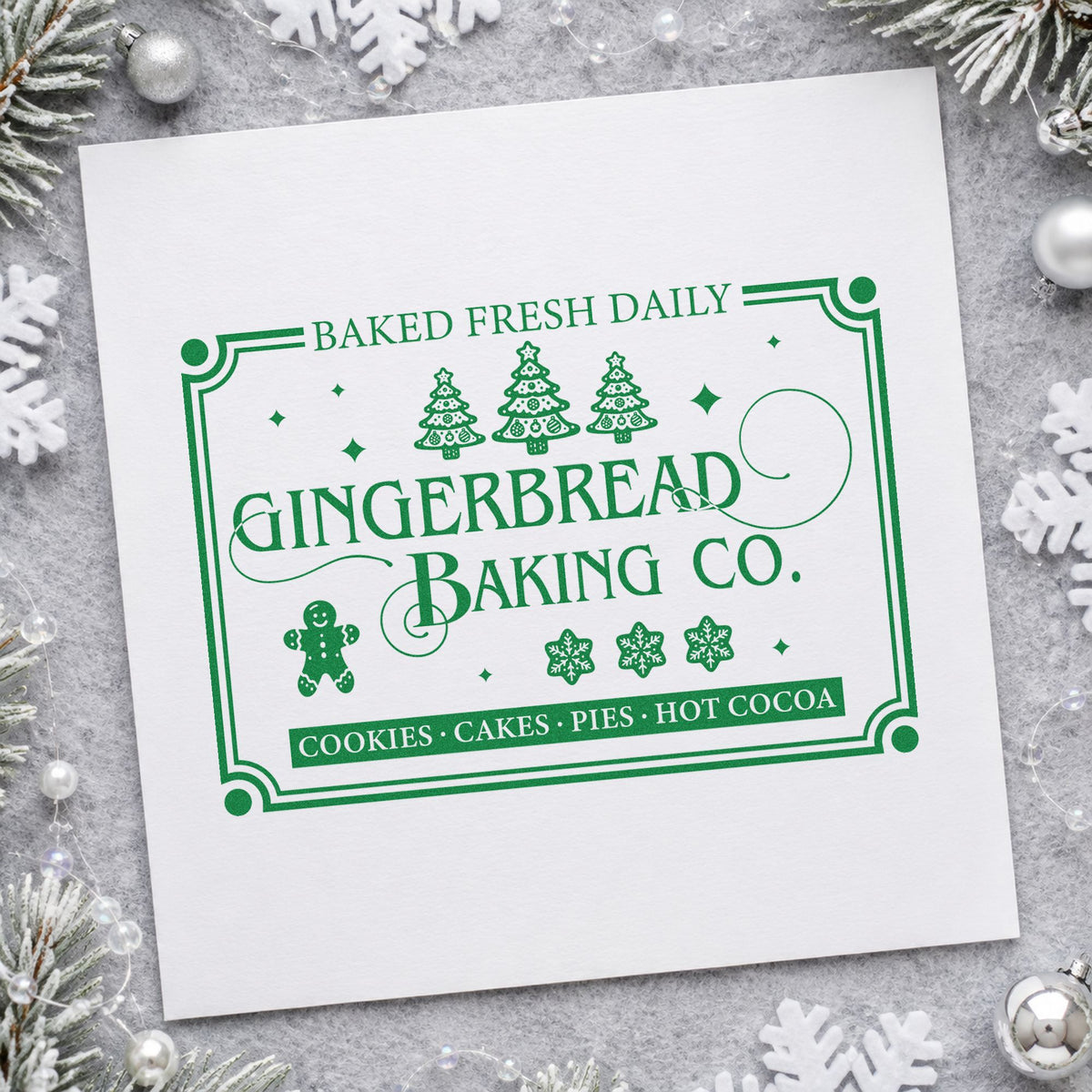 Gingerbread Baking Company Daily craft stamp imprinted in green ink on paper, a design suited to framed booth panel.