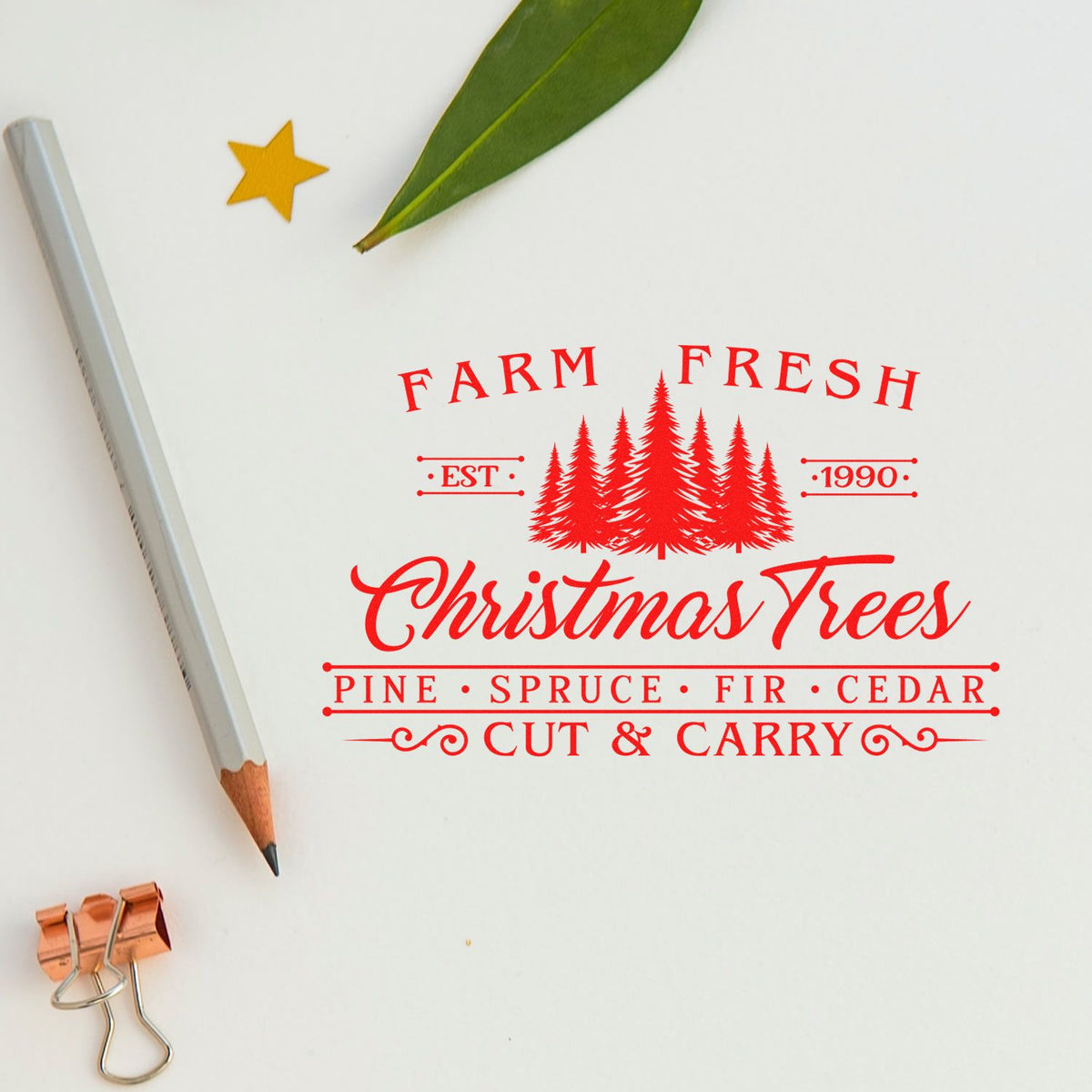 Custom rubber stamp mockup with red Farm Fresh Christmas Trees logo for Christmas tree farm branding and packaging