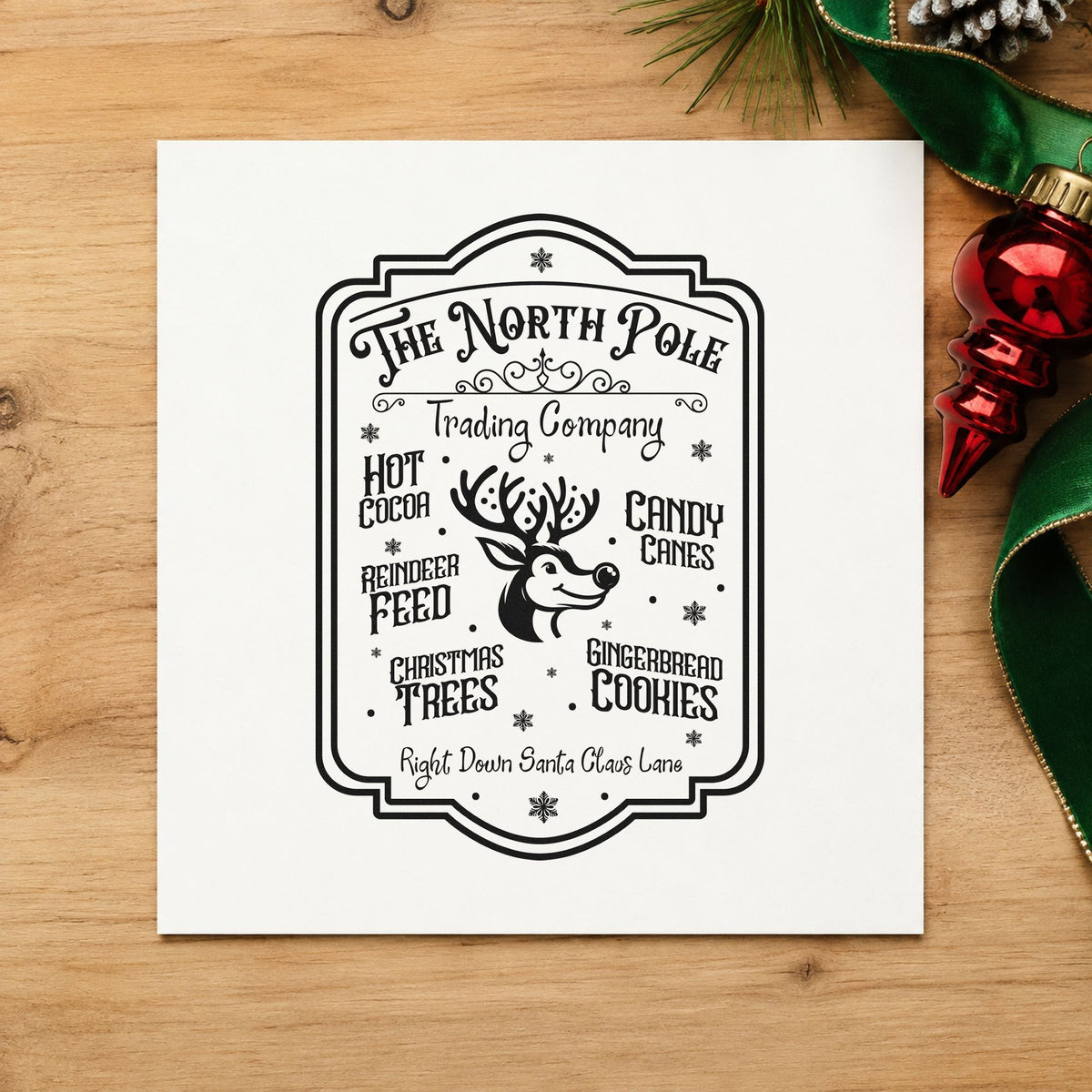 North Pole Trading Company Sign craft stamp imprint in black ink on a handmade project, one idea being dry goods tags.