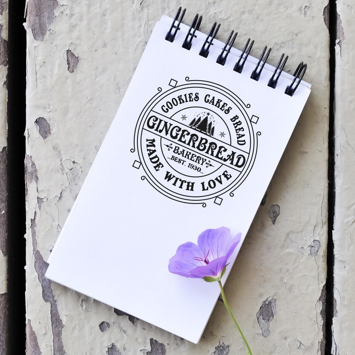 Custom bakery rubber stamp mockup with vintage gingerbread, cookies, cakes, bread and made with love logo.