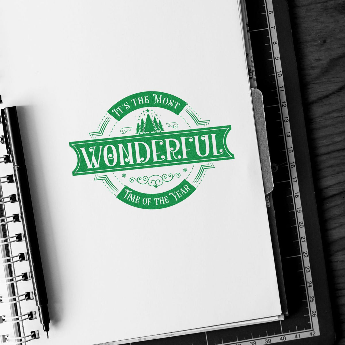 Green holiday rubber stamp design reading Its the most wonderful time of the year for seasonal crafts and packaging.