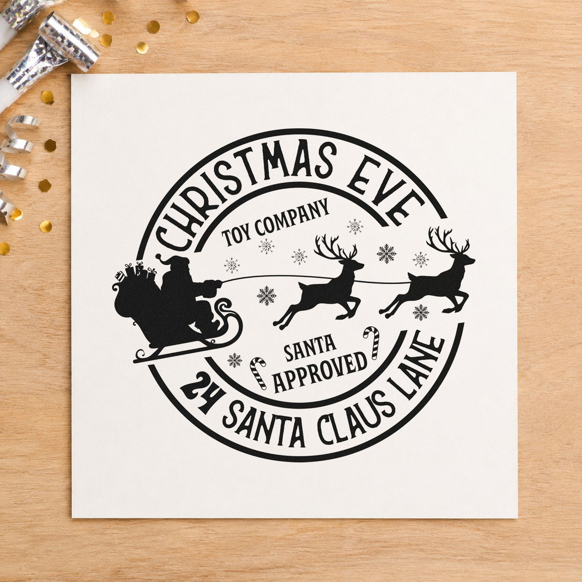 Christmas Eve Toy Company rubber stamp printed in black ink, ready for address emblem cards and similar paper crafts.