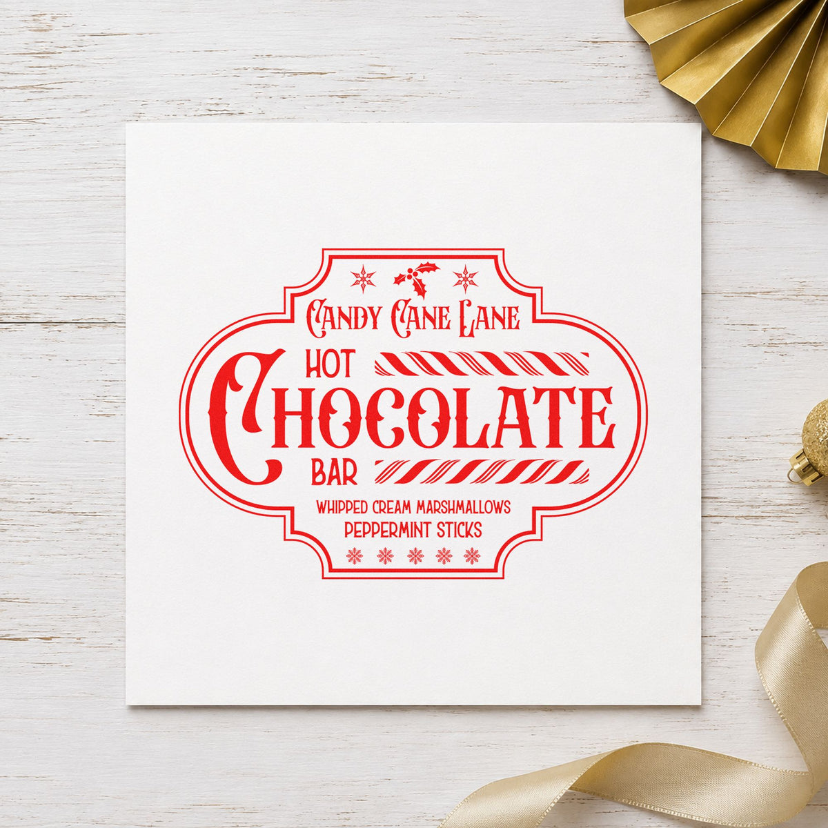 Candy Cane Lane Chocolate Bar craft stamp in red ink on cardstock, an easy option for table skirt printing.