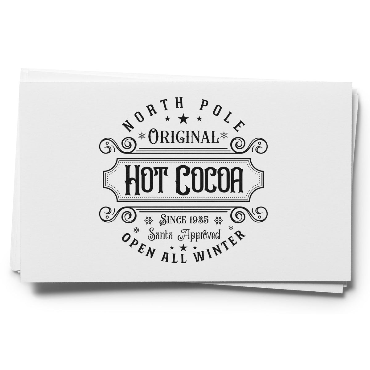 Vintage hot cocoa rubber stamp design for festive packaging, featuring North Pole, Santa approved, and open all winter text.