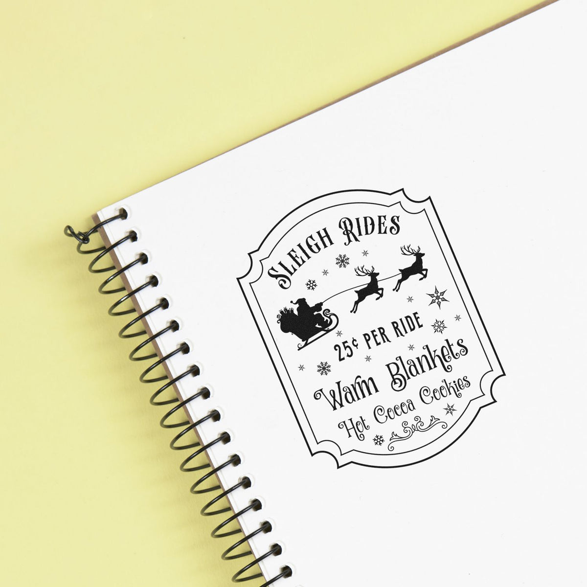 Custom holiday rubber stamp design with sleigh rides, Santa sleigh, reindeer, warm blankets, hot cocoa, and cookies.