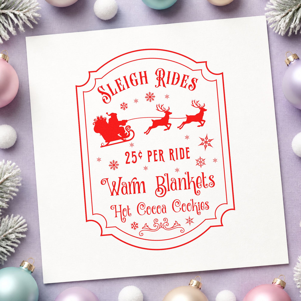 Sleigh Rides Warm Blankets rubber stamp shown in red ink, stamped for projects such as token bin labels.
