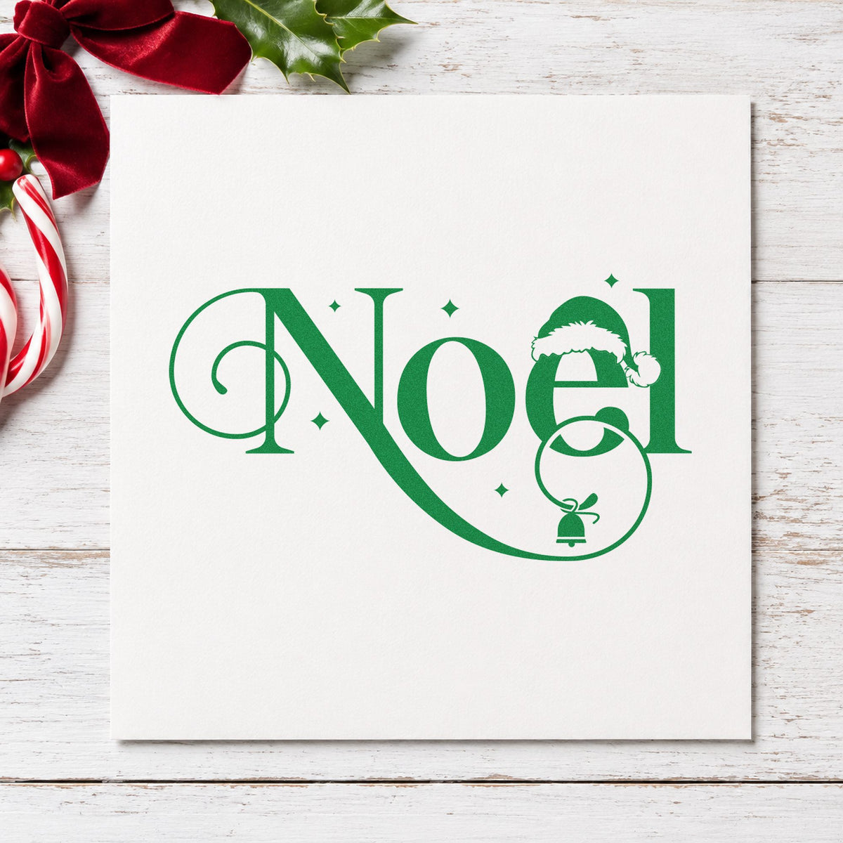 Noel Santa Hat Bell craft stamp in green ink on cardstock, an easy option for ornament album page.