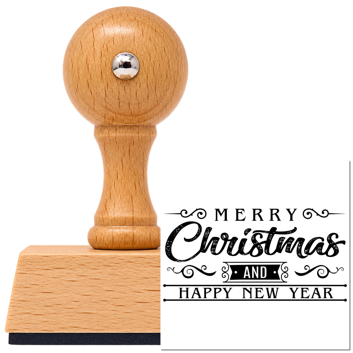 Merry Christmas And Happy New Year Vintage Pro rubber stamp in European beech wood with a round knob handle, shown beside its black imprint.