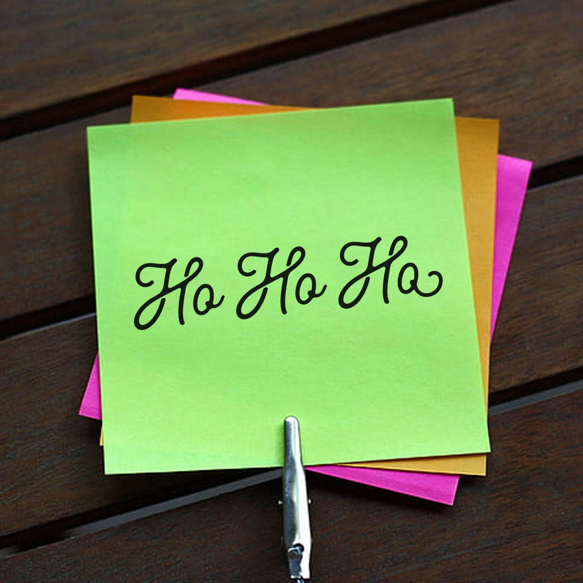 Christmas rubber stamp design with Ho Ho Ho on colorful sticky notes for festive holiday card making