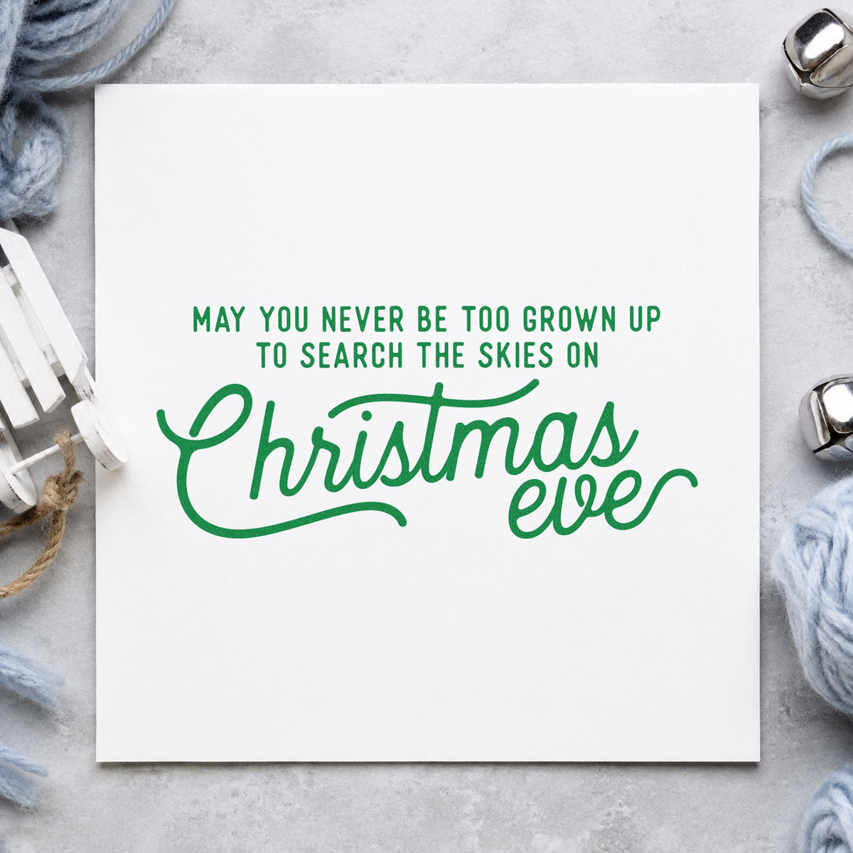 Never Grown Up Christmas Eve craft stamp in green ink on cardstock, an easy option for wonder album page.