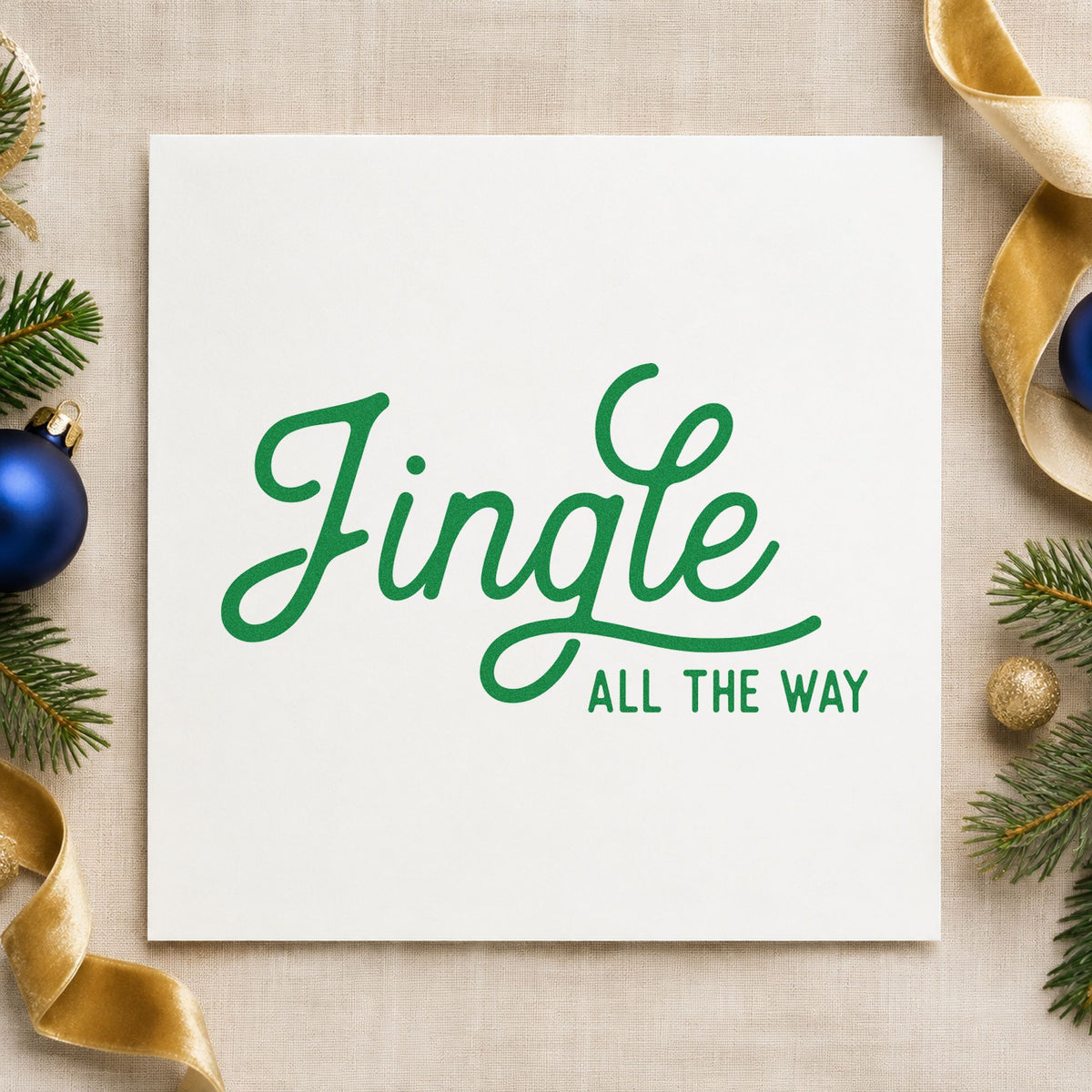Jingle All The Way Script craft stamp in green ink on cardstock, an easy option for layered album header.