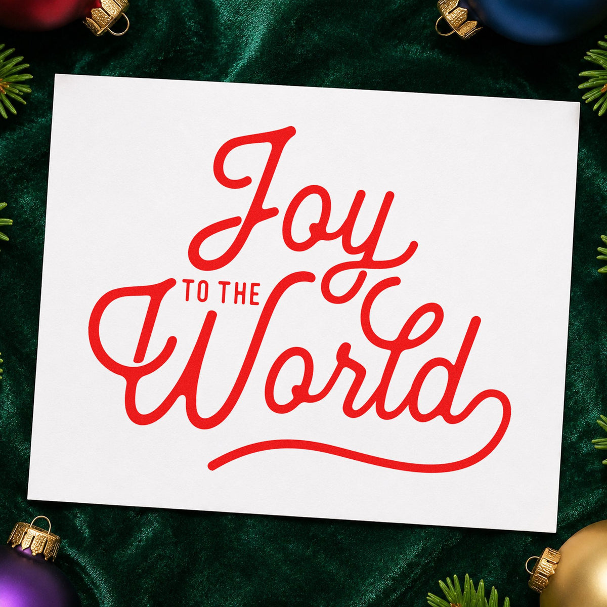 Joy To The World Script rubber stamp shown in red ink, stamped for projects such as crate face labels.