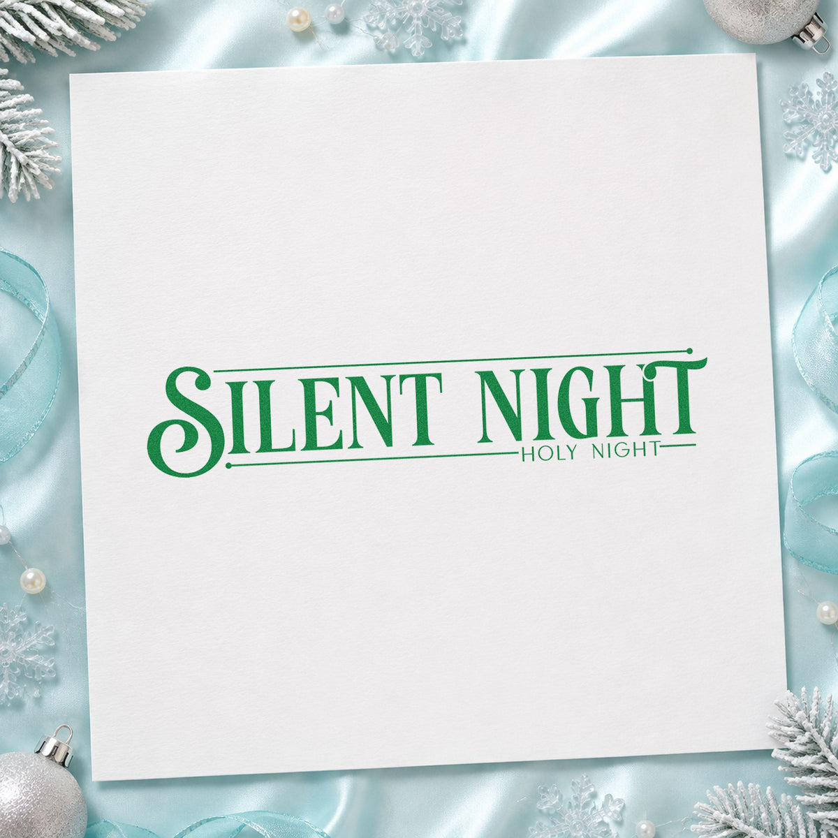 Silent Night Holy Night craft stamp imprint in green ink on a handmade project, one idea being candlelight slips.