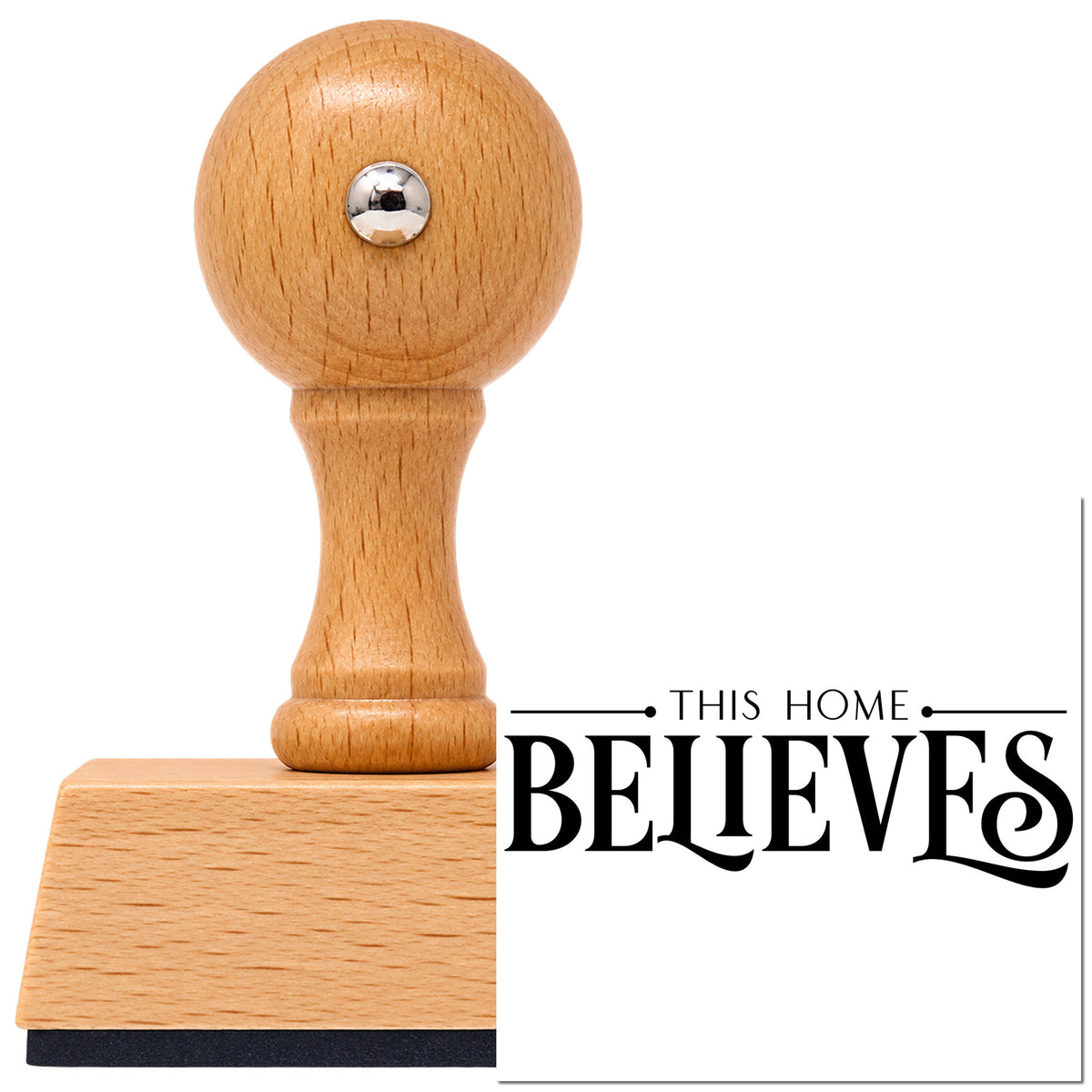 This Home Believes Serif Vintage Pro rubber stamp in European beech wood with a round knob handle, shown beside its black imprint.