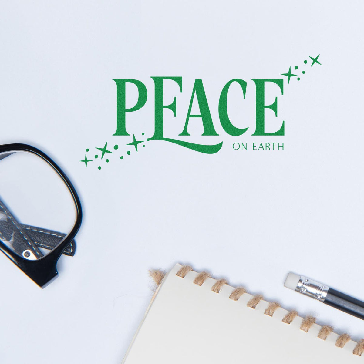 Green Peace on Earth rubber stamp impression on white paper, styled for holiday cards, crafts, and eco-friendly packaging.