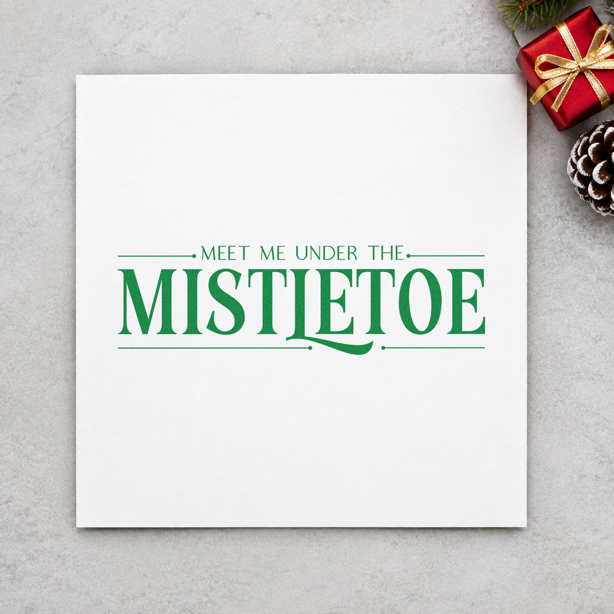 Meet Me Under The Mistletoe craft stamp imprint in green ink on a handmade project, one idea being order form inserts.